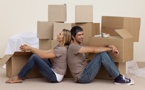 Packed boxes and furniture ready for house removals in Covent Garden